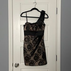 Black and gold lace dress with bow shoulder detail